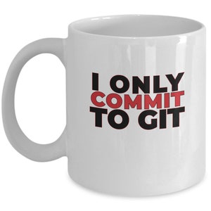 May include: White ceramic mug with a curved handle. The mug features the text "I ONLY COMMIT TO GIT" in black and red lettering, a humorous reference to software development.