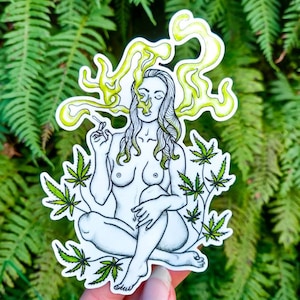 May include: A black and white line drawing of a person sitting with their legs crossed, surrounded by green marijuana leaves. The person is exhaling yellow smoke from their mouth.