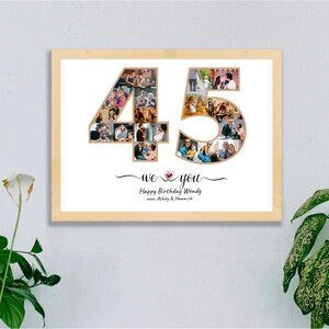 May include: A framed photo collage in a light wood frame. The collage is in the shape of the number 45, filled with various photos. Below the number is the text "we ❤️ you" and "Happy Birthday Wendy" with names.
