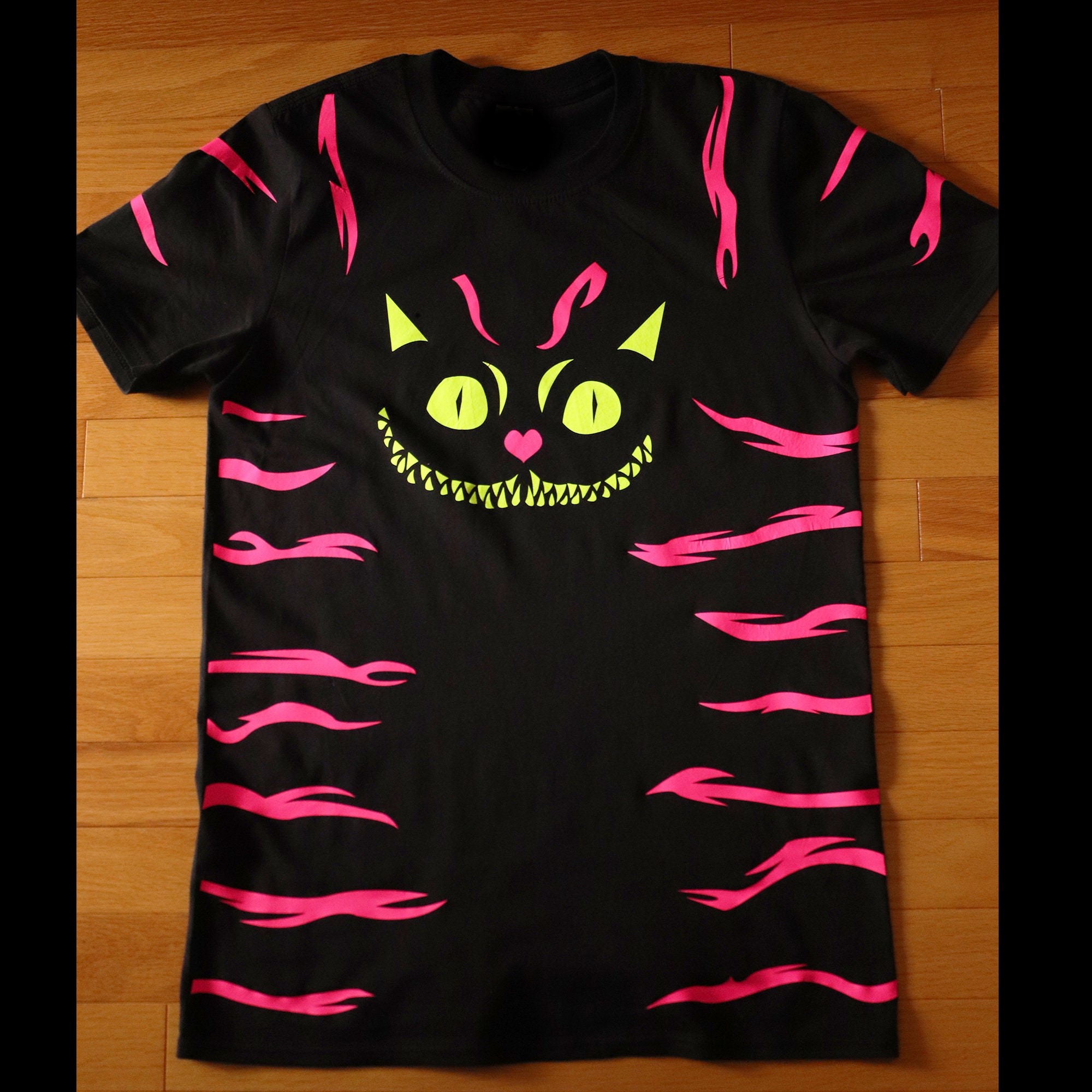 Cheshire Cat TShirt glows in UV light Etsy