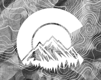 May include: A white graphic design of a mountain range with a sun rising behind it. The design is superimposed on a topographic map.