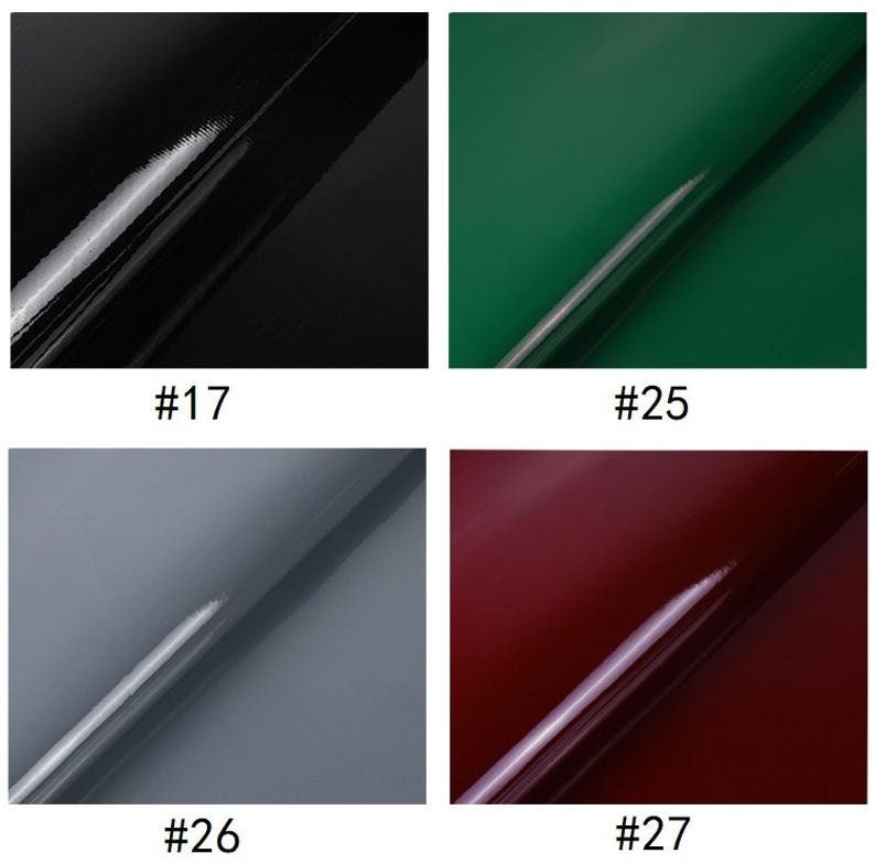 Puede incluir: Cuatro cuadrados brillantes de color, cada uno con una l&iacute;nea diagonal a trav&eacute;s de la superficie. Los colores son negro, verde, gris y burdeos. Los cuadrados est&aacute;n etiquetados con los n&uacute;meros 17, 25, 26 y 27.