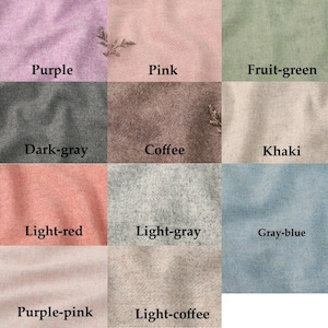 May include: A colour chart displaying 12 different fabric swatches in various shades of purple, pink, green, grey, red, blue, and brown. The swatches are labelled with their corresponding colour names.