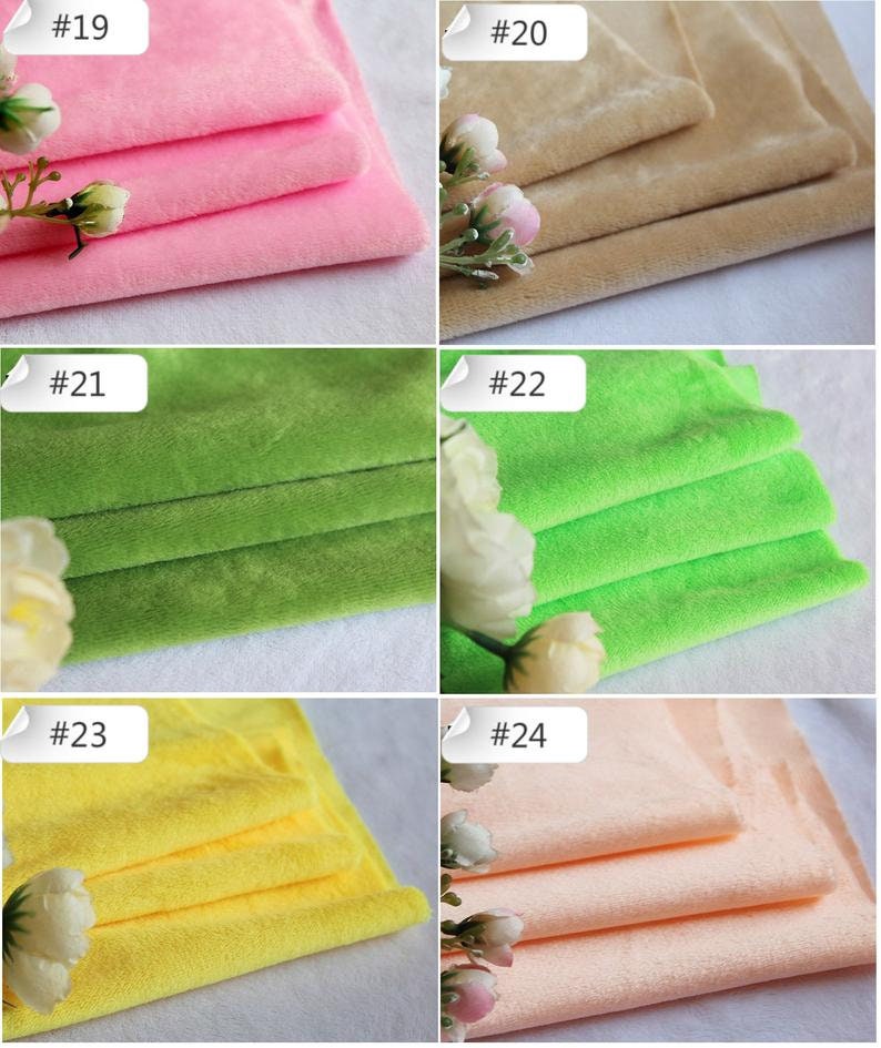 May include: Four rows of fabric swatches in different colors, including pink, beige, green, lime green, yellow, and peach. Each swatch is folded in thirds and labeled with a number from 19 to 24.