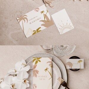 May include: A flat lay of a table setting with a white background. There are two cards with a tropical theme, one that says "Bachelorette Beach Party" and another that says "Summer Menu". There are also white orchids and a gold fork.