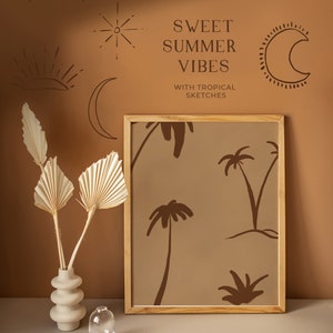 May include: A framed print featuring a brown background with a pattern of palm trees. The frame is made of wood and has a light brown finish. The print is displayed against a brown wall adorned with various hand-drawn symbols, including stars, moons, and suns. The text "SWEET SUMMER VIBES WITH TROPICAL SKETCHES" is written in brown text on the wall.