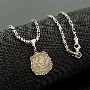 Sterling Silver Lion Head Pendant Necklace: Byzantine Chain, Power Symbol