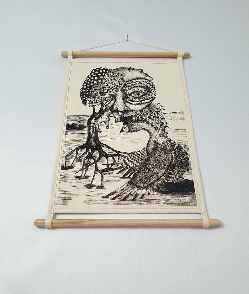 May include: Black and white ink drawing of a tree with a human face and a bird with a human face. The tree has roots and the bird has wings. The drawing is on a canvas with a wooden frame.