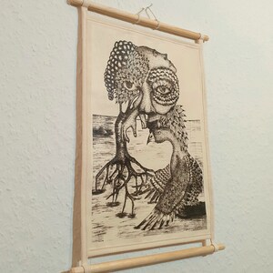 May include: A black and white illustration of a tree with a human face and a bird with a human face. The tree has roots and the bird has wings. The illustration is on a white canvas with a wooden frame.