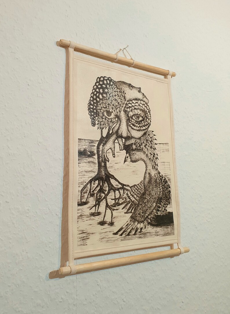 May include: A black and white illustration of a tree with a human face and a bird with a human face. The tree has roots and the bird has wings. The illustration is on a white canvas with a wooden frame.