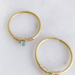 18k gold vermeil small bejewelled hoop earrings in a matte finish with beautiful emerald drops image 2