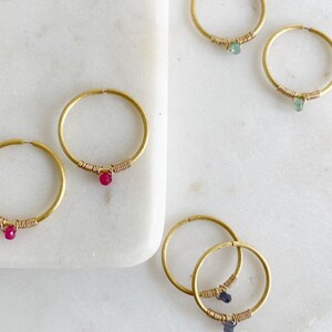 18k gold vermeil small bejewelled hoop earrings in a matte finish with beautiful emerald drops image 3