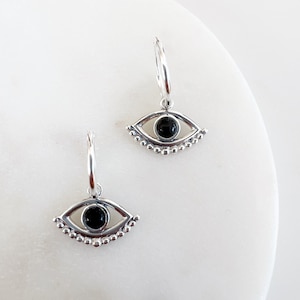 Evil Eye Huggie Hoops in Sterling Silver