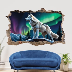 May include: A white wolf stands on a snowy mountain peak, looking out at a vibrant green and purple aurora borealis in the night sky.