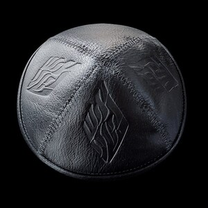 Black leather Kippah stamped with a Magen David or the HaEsh Sheli - My Fire logo of Rabbi Nahman of Breslov