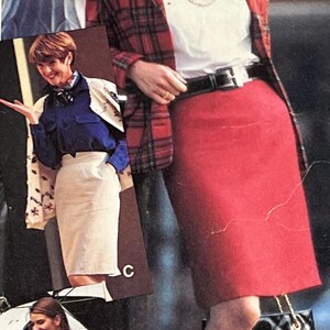 May include: Three women wearing different outfits. The woman in the center is wearing a red plaid blazer, a white shirt, a black belt, a red skirt, and black heels. She is holding a black quilted handbag. The woman on the left is wearing a white sweater, a blue shirt, a white skirt, and black shoes. The woman on the right is wearing a gray blazer, a white shirt, a gray skirt, and black shoes. She is holding a black umbrella.