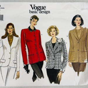 May include: A Vogue basic design sewing pattern envelope 1643 featuring illustrations of four different blazer styles. The designs include a white blazer, a red blazer with a dark collar, a black and white houndstooth blazer, and a tan blazer.