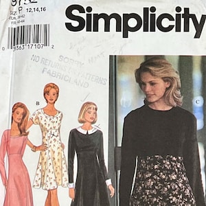 May include: A sewing pattern for three different dresses. The pattern is for sizes 12, 14, and 16. The pattern is from Simplicity and includes the text "SORRY NMT NO RETURNS ON PATTERNS FABRICLAND".