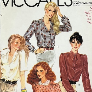 May include: A sewing pattern featuring four different blouse designs. The blouses are shown on four different models. The pattern is from a Norton Simon Inc. company.