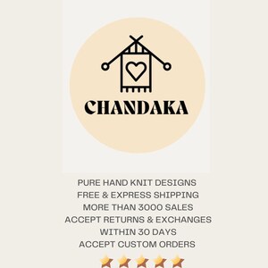 May include: A logo for a shop called "CHANDAKA" that sells hand-knitted designs. The logo features a stylized image of a knitting needle and yarn with a heart in the center.