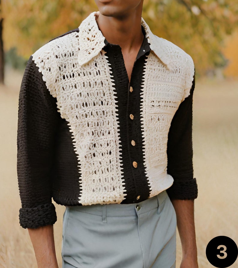May include: A long-sleeved shirt in black and white with a crocheted design. The shirt has a button-up front and a collar.