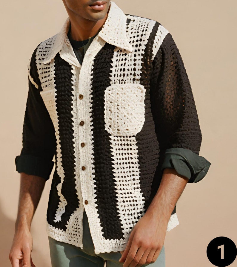 May include: A black and white crocheted long-sleeved shirt with a button-up front and a patch pocket on the left side.