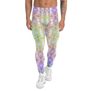 Puede incluir: Un par de leggings coloridos con un patrón geométrico en tonos de rosa, amarillo, azul y verde. Los leggings están hechos de una tela elástica y cómoda, y son perfectos para yoga, correr o cualquier otro entrenamiento.