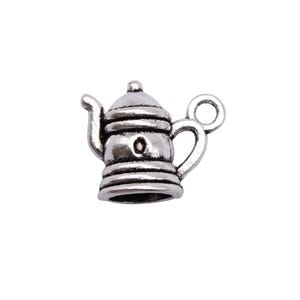 May include: A small, silver-colored teapot charm with a detailed design. The charm features a spout, handle, and a lid with a small knob. The teapot has a vintage or antique aesthetic, suitable for jewelry making or crafting projects.