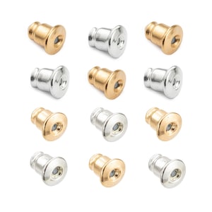 May include: Twelve earring backs in two colors: gold and silver. The backs are round and have a small hole in the center.