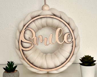 Wool wreath "Smile", door wreath made of merino wool with lettering made of wood
