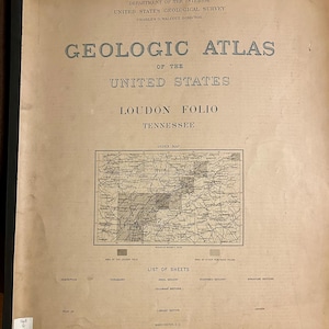 May include: A vintage Geologic Atlas of the United States, Loudon Folio, Tennessee. The cover features text in blue and black, including the title and the United States Geological Survey information. An index map and a list of sheets are also visible.