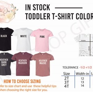 May include: A size chart for toddler t-shirts with different color options. The chart shows the width and length in inches for sizes 2T, 3T, and 4T. The colors include black, white, pink, heather dark grey, heather maroon, and heather mauve.