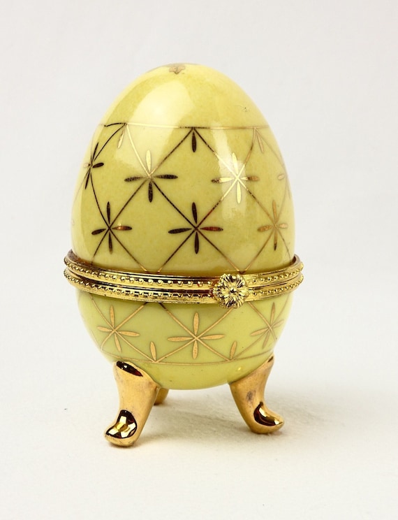 Yellow Enamel on Porcelain Egg Shaped Hinged Foot… - image 1