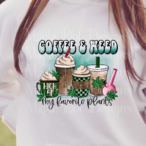 May include: White hoodie with a graphic design of coffee and weed cups with the text "Coffee & Weed My Favorite Plants".