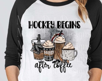May include: A white and black raglan baseball tee with the text "HOCKEY BEGINS after coffee" in black. The graphic features coffee cups and hockey-themed elements. The shirt has black sleeves and a white body.
