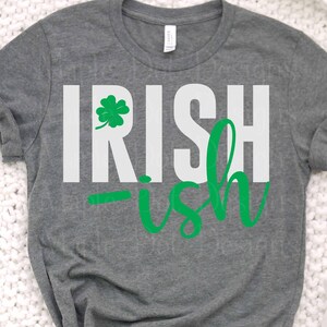 May include: A gray t-shirt with the text "IRISH-ish" in white and green. A green shamrock is above the word "IRISH".