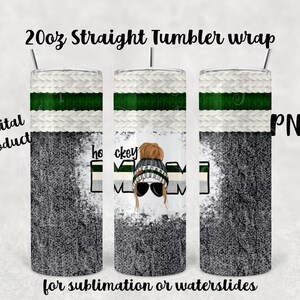 May include: A sublimation design for a 20oz straight tumbler featuring a hockey mom with the text "Hockey Mom". The design includes a white knit pattern with a green stripe, a gray background, and a white and green hockey stick.