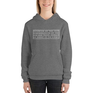 Reporter du nouveau sweat à capuche Unisex