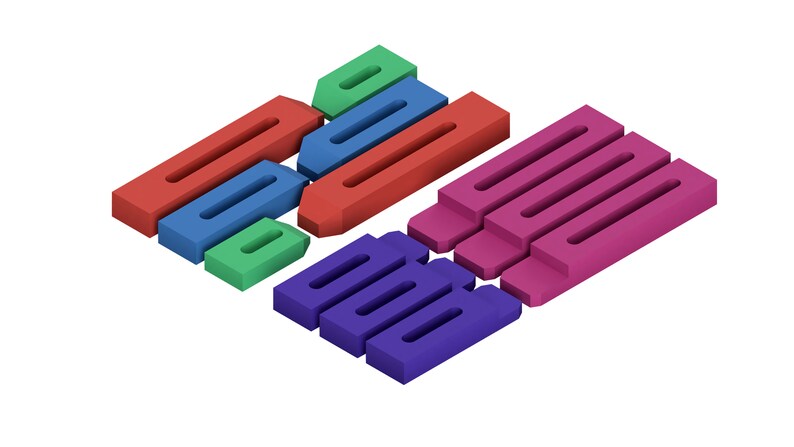May include: An assortment of colorful, geometric shapes in red, blue, green, purple, and pink. The shapes are rectangular with a long, narrow cutout. The arrangement suggests a puzzle or building blocks.