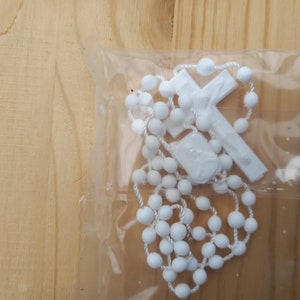White plastic rosary.
