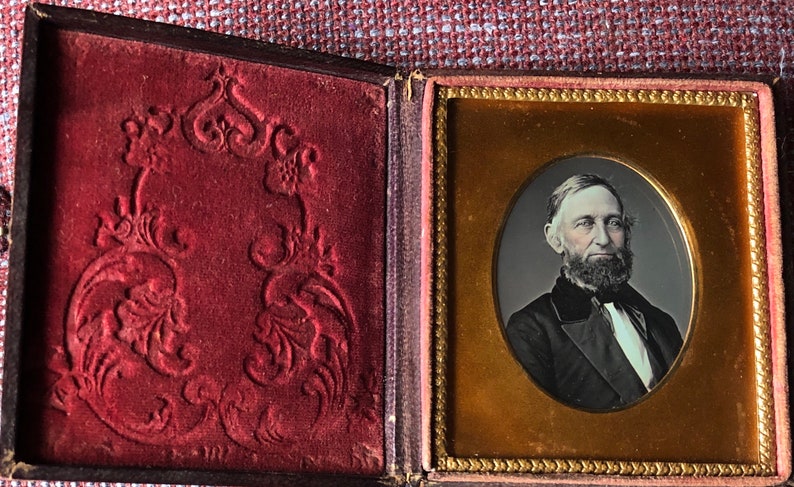 Tinted face A 6th plate daguerreotype of a man in a complete case Full beard Fashion.