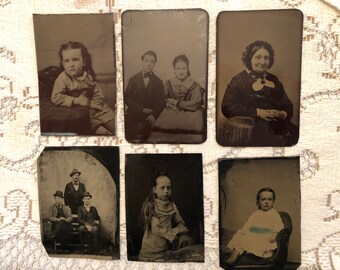 Six CDV sized tintypes of three children,group of men, a couple, and an older woman. Fashion.