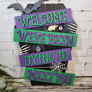 Welcome We've Been Dying to Meet You Door Hanger | Handpainted Wood