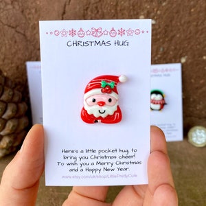 Die ursprüngliche kleine Taschen-Weihnachtsumarmung
