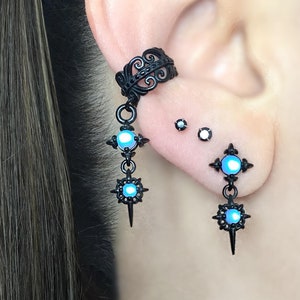 Starburst ear cuff, Star ear cuff, gothic ear cuff, single earring, gothic earring, ear cuff, cuff earring, star earring. fake piercing