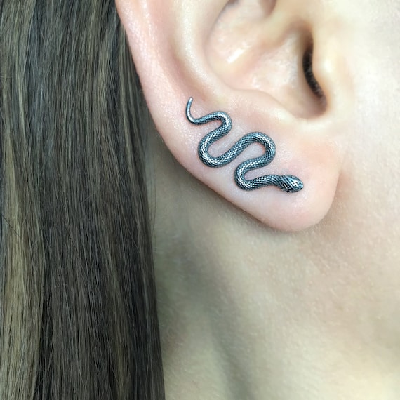 Tattoo uploaded by Spoken Hand Tattoo  Snake collarbone  Tattoodo
