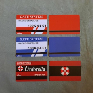 Blaues und rotes Torsystem mit Schlüsselkarte von Resident Evil 2, Hauptschlüssel des Umbrella-Schlosssystems