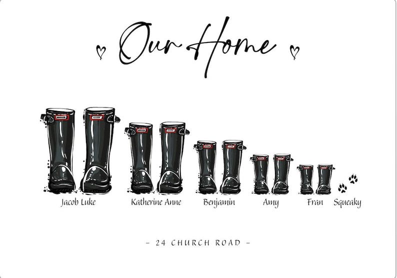 May include: A white wall art print featuring the text Our Home with two small hearts. Below are five pairs of black rubber boots in descending sizes, labeled Jacob Luke, Katherine Anne, Benjamin, Amy, and Fran, plus paw prints labeled Squeaky.