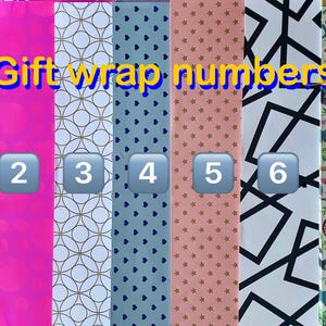 May include: Seven vertical strips of gift wrap paper labeled with numbers one through seven. Patterns include colorful circles, solid bright pink, white geometric circles, blue hearts, pink stars, black abstract lines, and a multi-colored animal print.