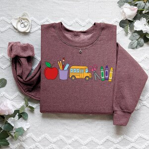 Cute Teacher Stuff Sweatshirt, Teacher Life Shirt, School Supplies Shirt, Back To School, Team Teacher Shirt, First Day Of School Outfit image 7